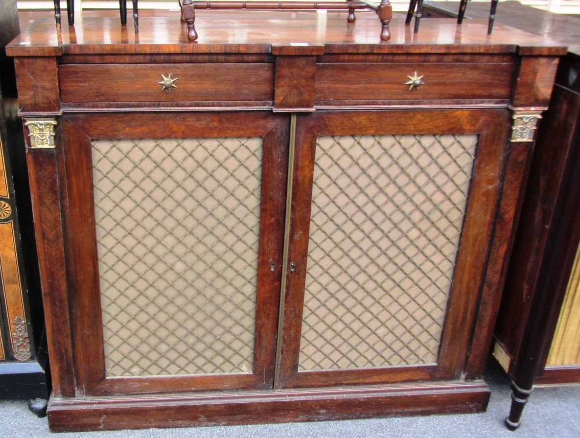 Appraisal: An early Victorian rosewood gilt metal mounted chiffonier with pair