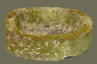 Appraisal: A YORKSHIRE STONE TROUGH of rough hewn irregular oval form