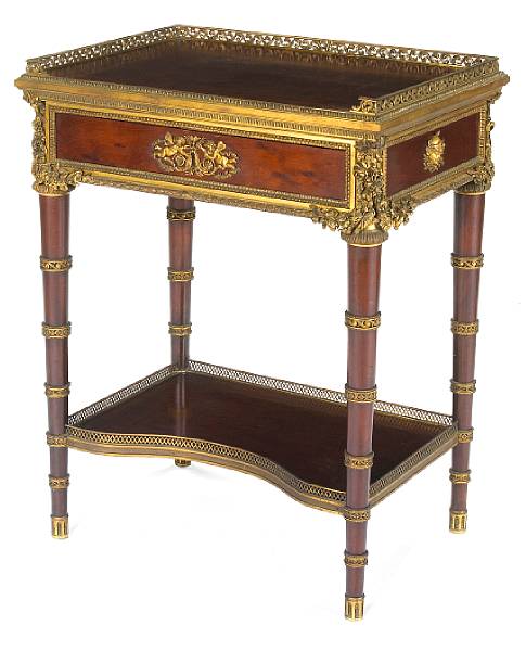 Appraisal: A XVI style gilt bronze mounted mahogany table crirefourth quarter