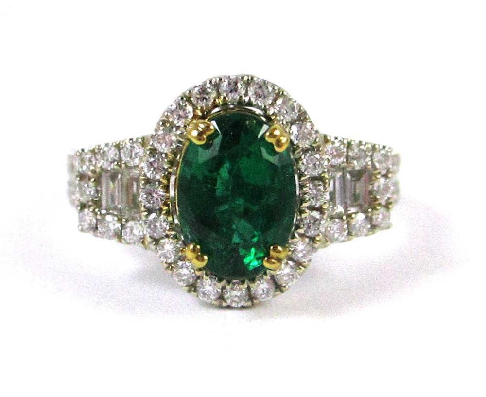 Appraisal: EMERALD DIAMOND AND FOURTEEN KARAT GOLD RING The k white