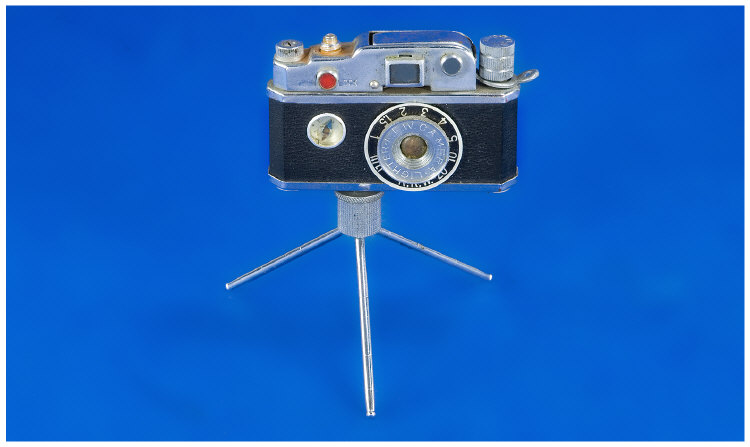 Appraisal: Camera Style Cigarette Lighter on Tripod