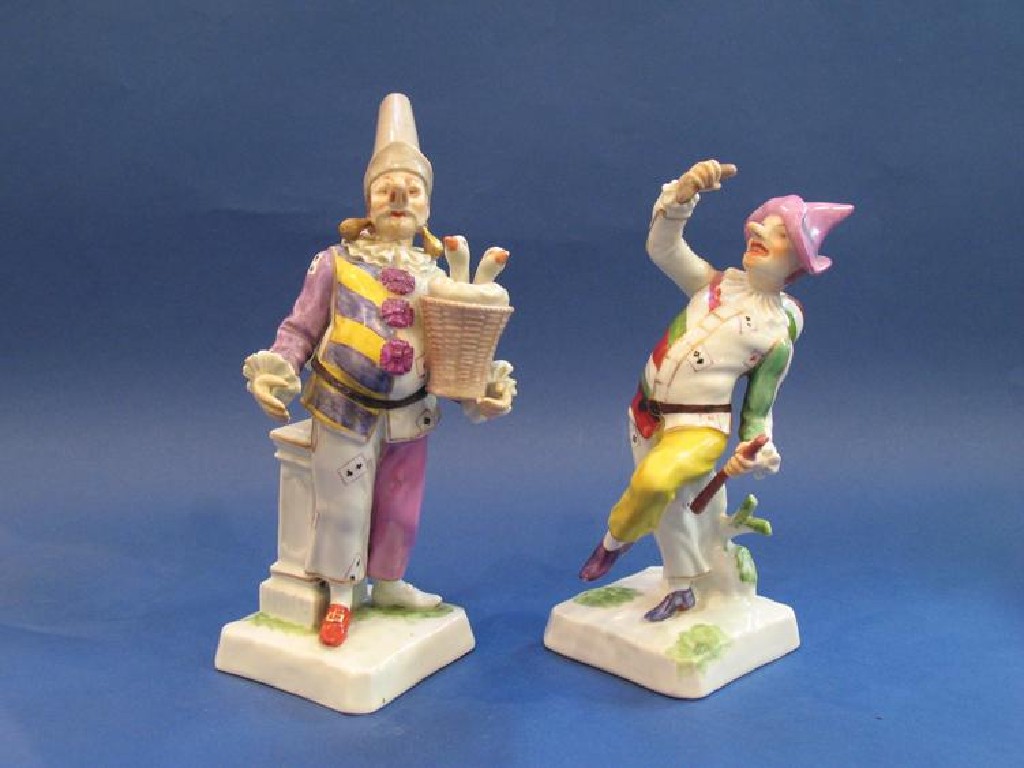 Appraisal: A CONTINENTAL PORCELAIN FIGURE OF A HARLEQUIN with a long