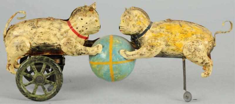 Appraisal: Hand-Painted Tin Cats Ball Wind-Up Toy German Working Complete restoration