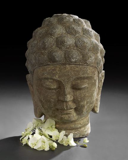 Appraisal: Monumental Cast Stone Head of a Serene Buddha the hair