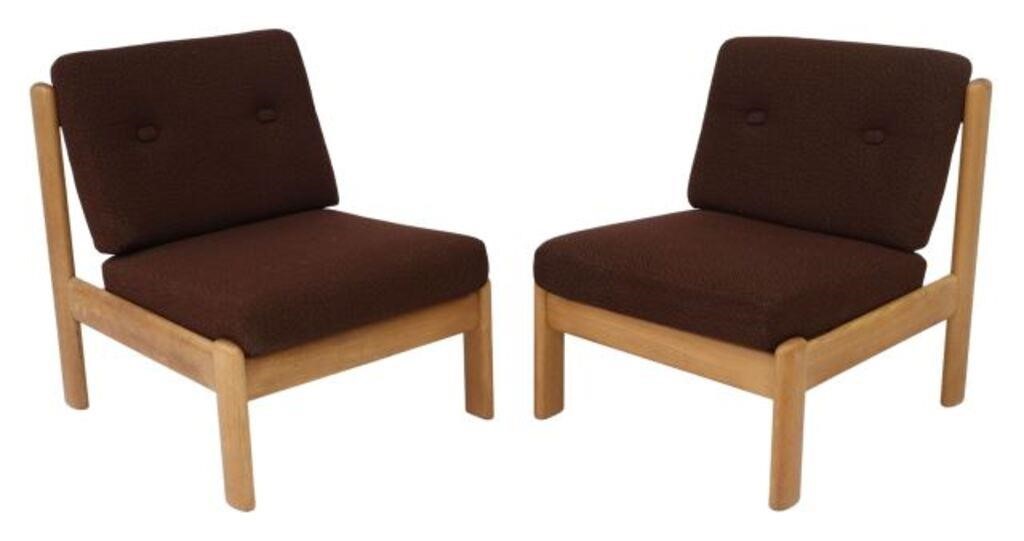 Appraisal: pair Swedish mid-century modern oak framed lounge chairs c s