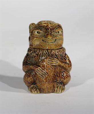 Appraisal: A rare Martin Brothers stoneware monkey jar and cover by