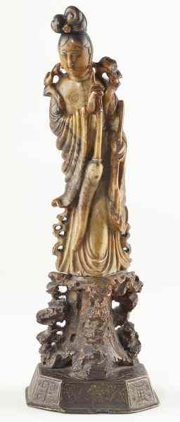 Appraisal: Chinese Qing Dynasty Guanyin Statuettepossibly th century dark tan soapstone