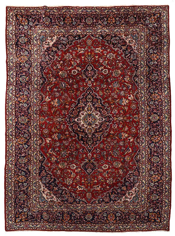 Appraisal: Persian Carpet th century red field with blue central medallion