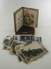 Appraisal: Two Victorian cartes-de-visite albums and a large quantity of photos