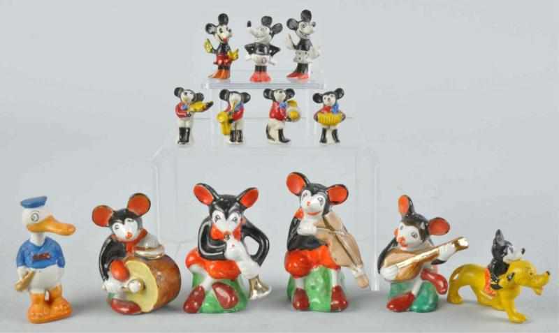 Appraisal: Lot of Disney Disney-Inspired Figurines Description Bisque china and lead