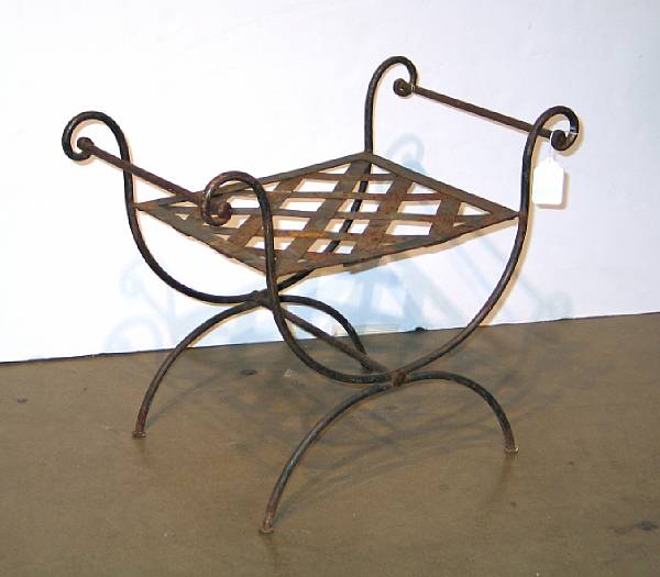 Appraisal: A Neoclassical style iron curule garden seat height in width