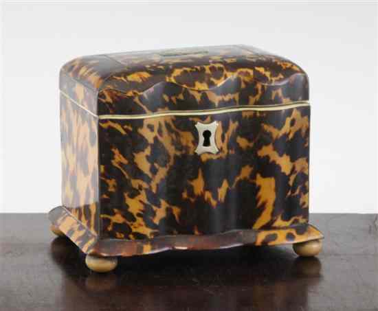 Appraisal: An early th century tortoiseshell and ivory serpentine tea caddy