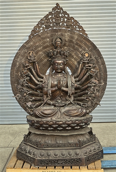 Appraisal: Large Chinese bronze thousand armed Guanyin with elaborate mandorla x