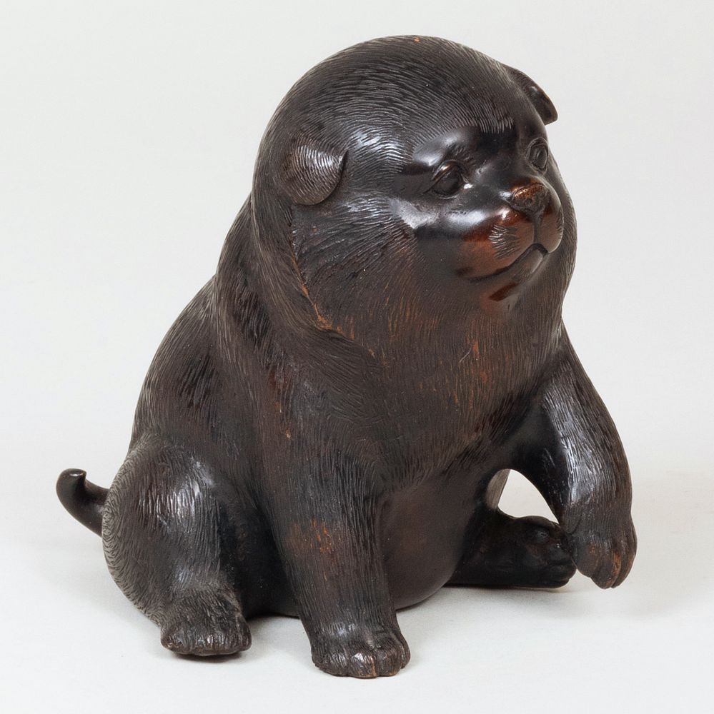 Appraisal: Japanese Bronze Model of a Puppy Incised two character mark