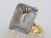 Appraisal: An carat gold and blue topaz dress ring the rectangular