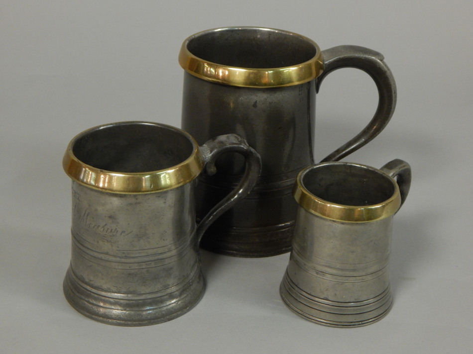 Appraisal: Three early thC brass and pewter measures a quart a