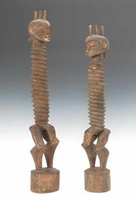 Appraisal: A Pair of African Figures with Elongated Necks Carved wood