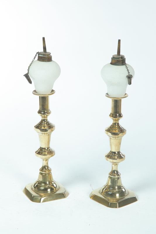 Appraisal: PAIR OF PEG LAMPS American th century white glass Inverted