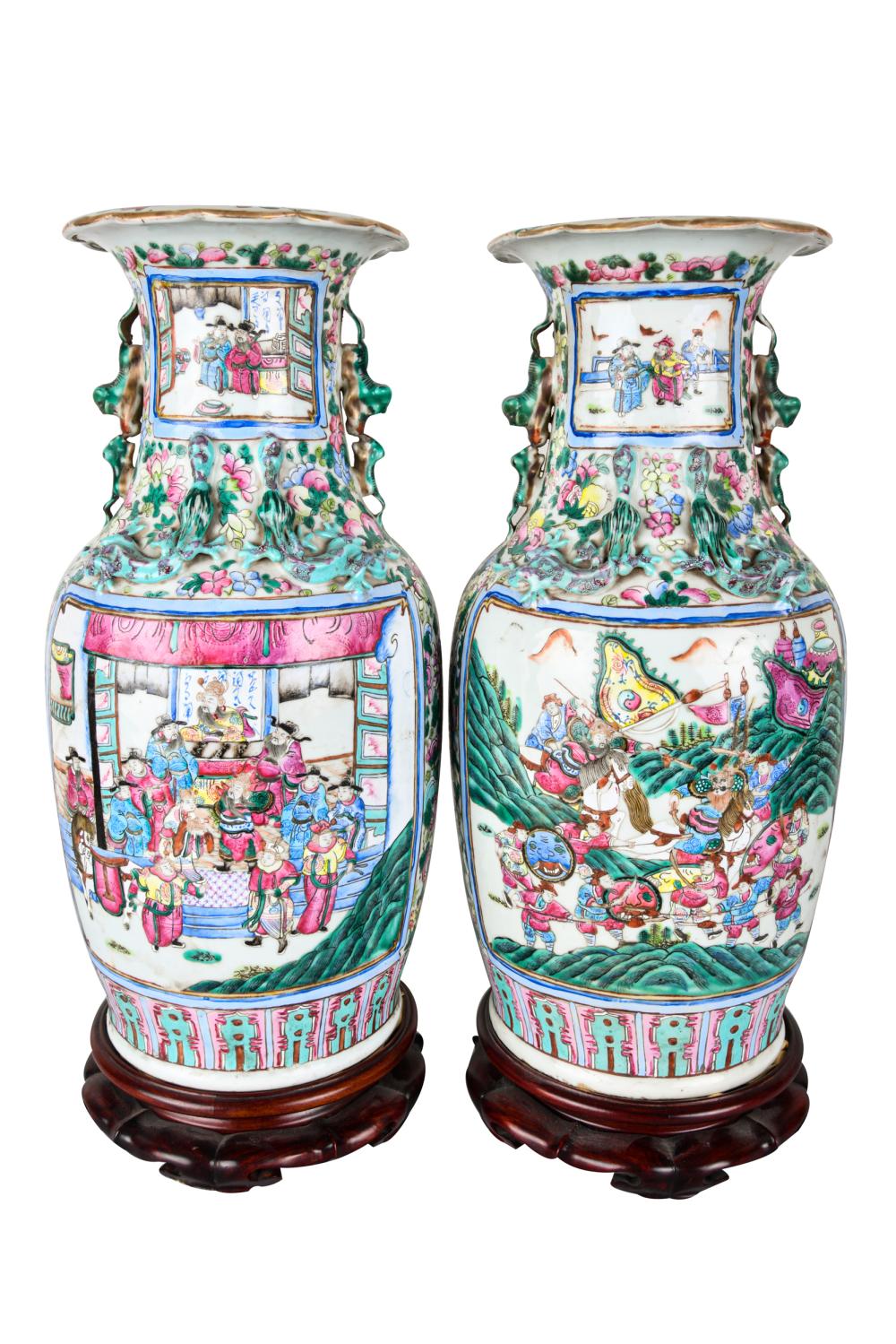 Appraisal: PAIR OF CHINESE 'FAMILLE ROSE' PORCELAIN VASESon carved wood stands