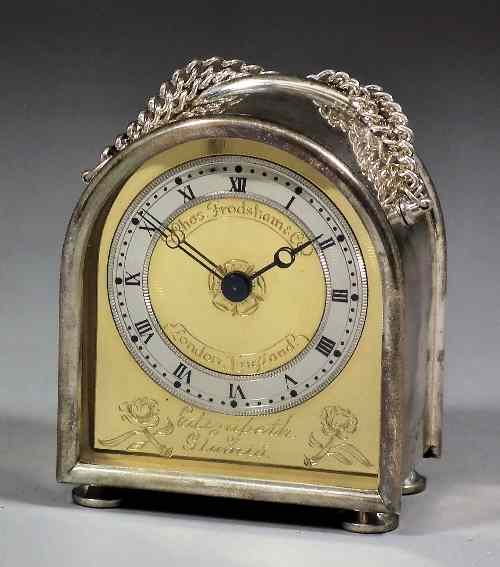 Appraisal: An Elizabeth II silver cased ''Milestone'' pattern carriage clock by