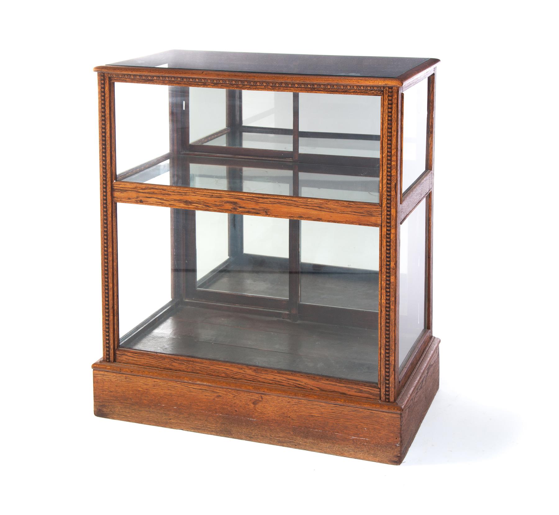 Appraisal: AMERICAN STORE DISPLAY CASE Late th century oak One-piece case