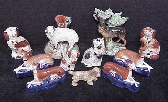 Appraisal: Assortment of th C English Staffordshire figures dogs deer sheep