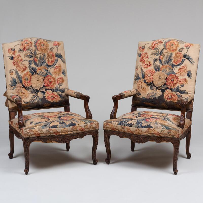 Appraisal: Pair of R gence Style Stained Beechwood and Tapestry Upholstered