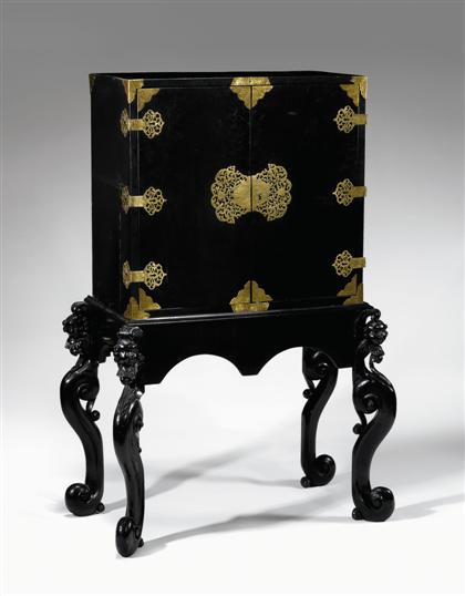 Appraisal: Continental ebonized and gilt brass mounted cabinet on stand incorporating