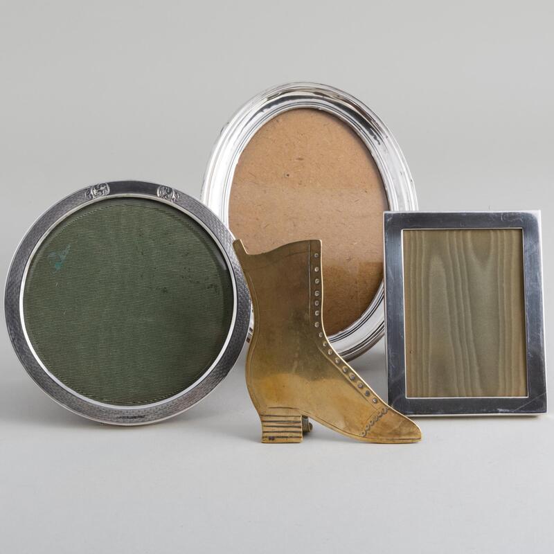 Appraisal: Three Silver Picture Frames and a Brass Model of a