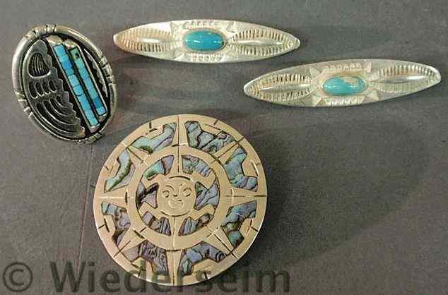 Appraisal: Two Mexican silver and turquoise bar pins a native American