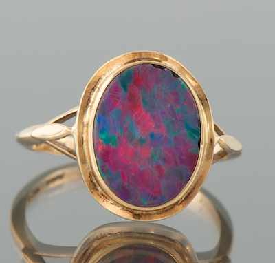 Appraisal: A Ladies' Opal Doublet Ring Yellow gold ring with a