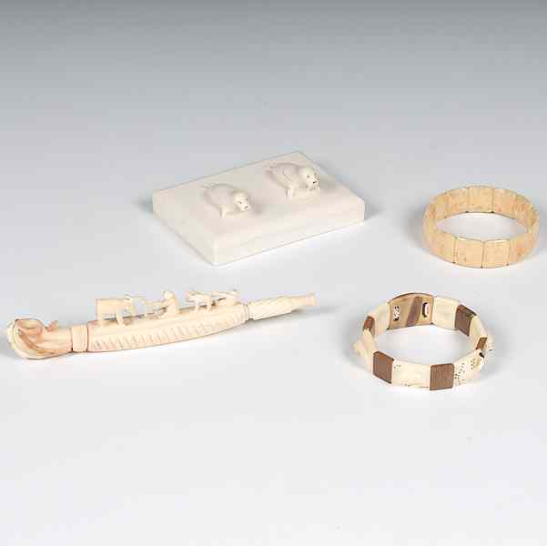 Appraisal: Eskimo Carved Ivory Bracelets Paper weight and Pipe Collected by