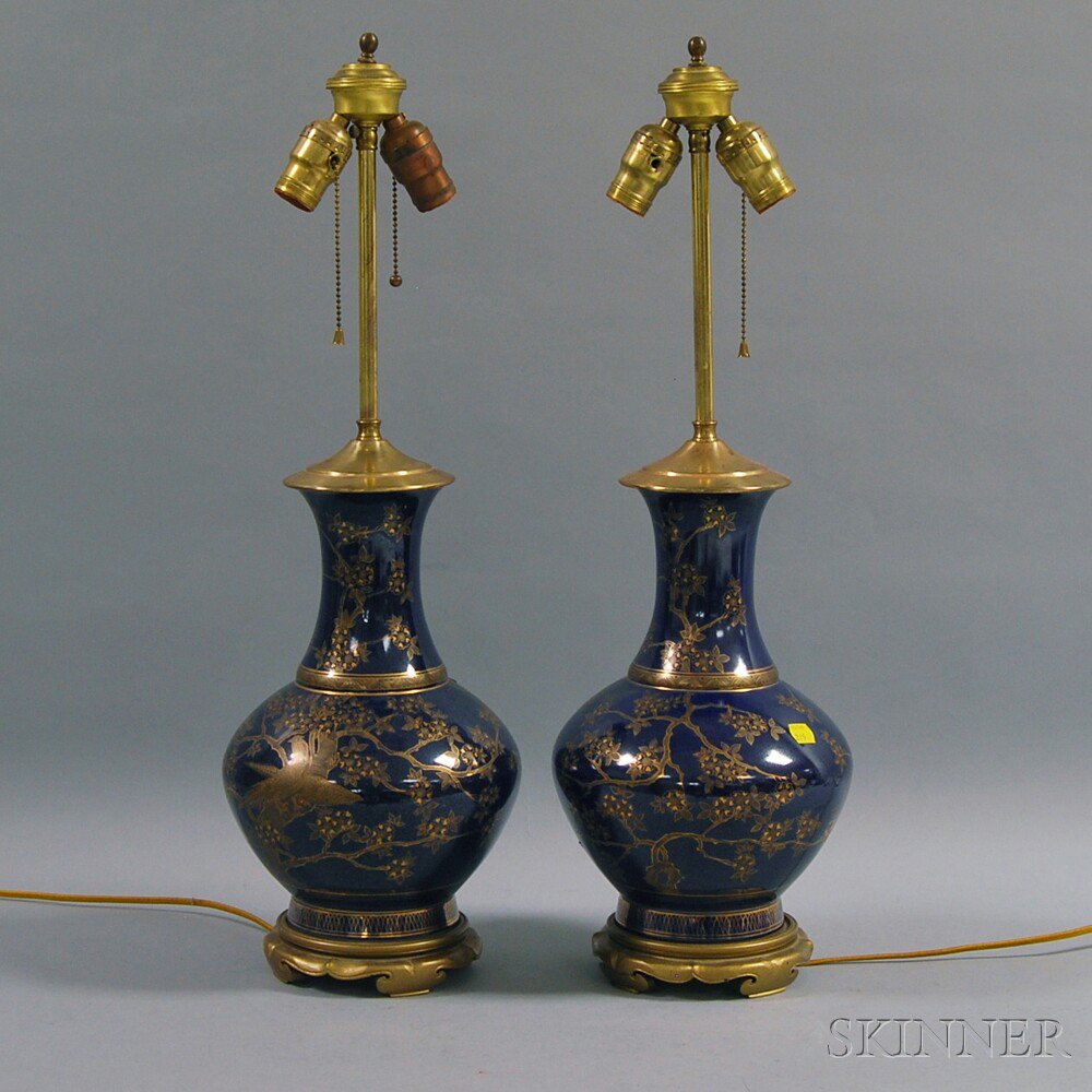 Appraisal: Pair of Gilt Blue Porcelain Vase Table Lamps decorated with