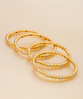 Appraisal: A Collection of Karat Yellow Gold Platinum and Diamond Bangle