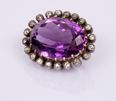 Appraisal: An amethyst and diamond brooch the large oval amethyst to