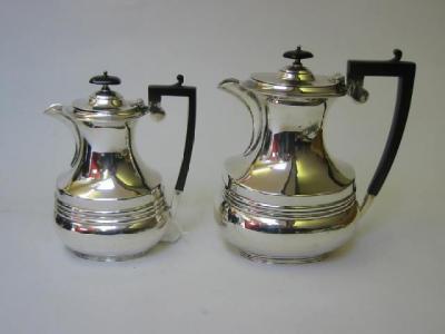 Appraisal: A PAIR OF COFFEE POTS maker William Fordham Faulkener Sheffield