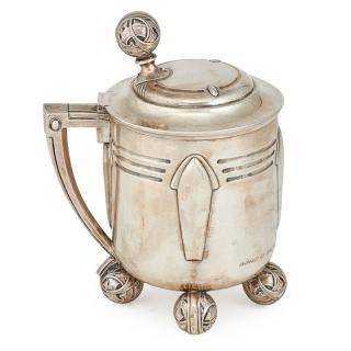 Appraisal: SWEDISH SILVER TANKARD Line and arrow decoration on four ball