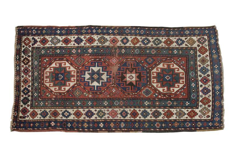 Appraisal: Caucasian Kazak Oriental Rug ca having four Memlic gul medallions