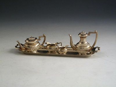 Appraisal: A modern miniature silver four piece tea and coffee set