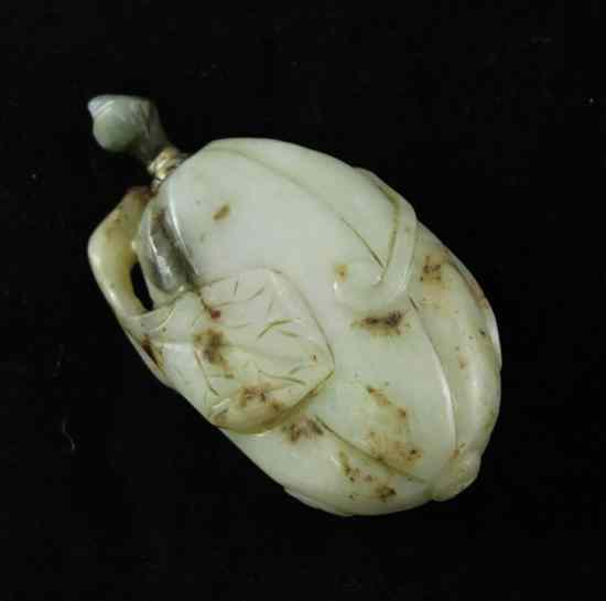 Appraisal: A Chinese pale celadon jade carving of a bitter melon