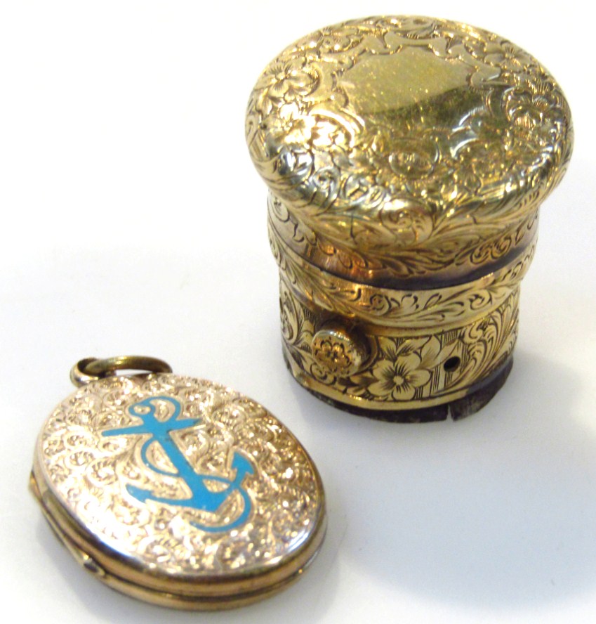 Appraisal: An Edwardian locket the oval shaped engine turned body with