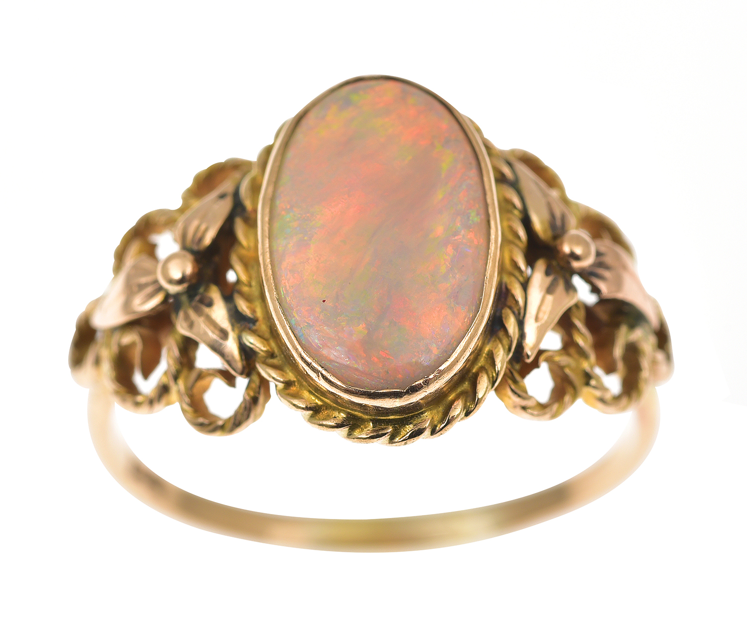 Appraisal: AN OPAL RING The oval solid white opal cut en