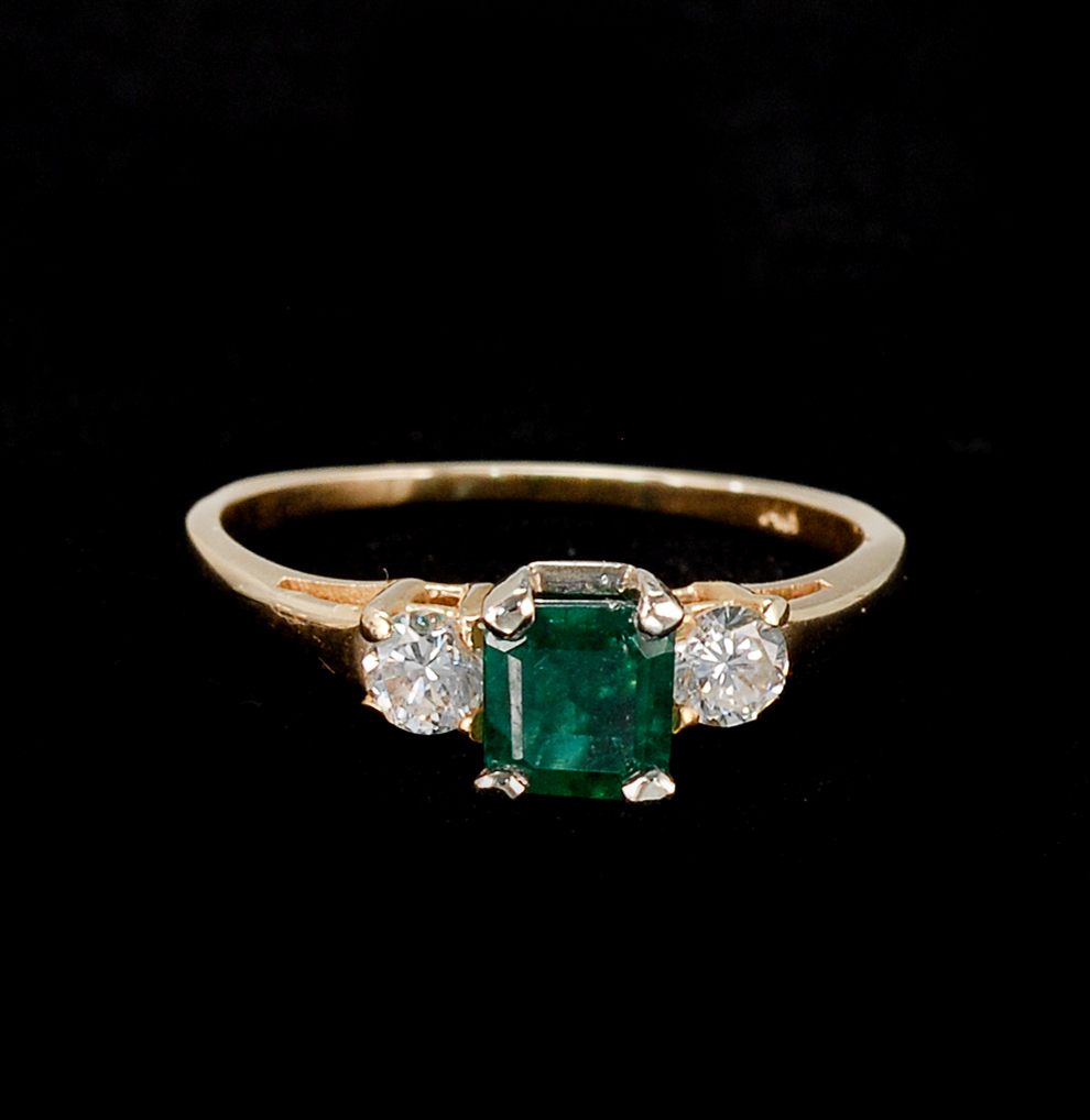 Appraisal: KT GOLD EMERALD AND DIAMOND RING Central mm square-cut emerald