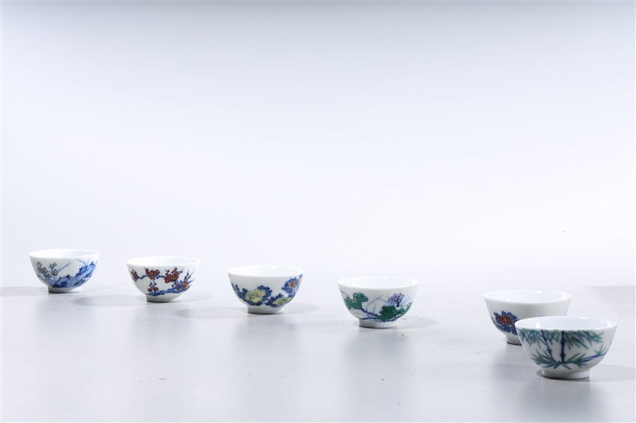 Appraisal: Set of six Chinese enameled porcelain tea cups with various