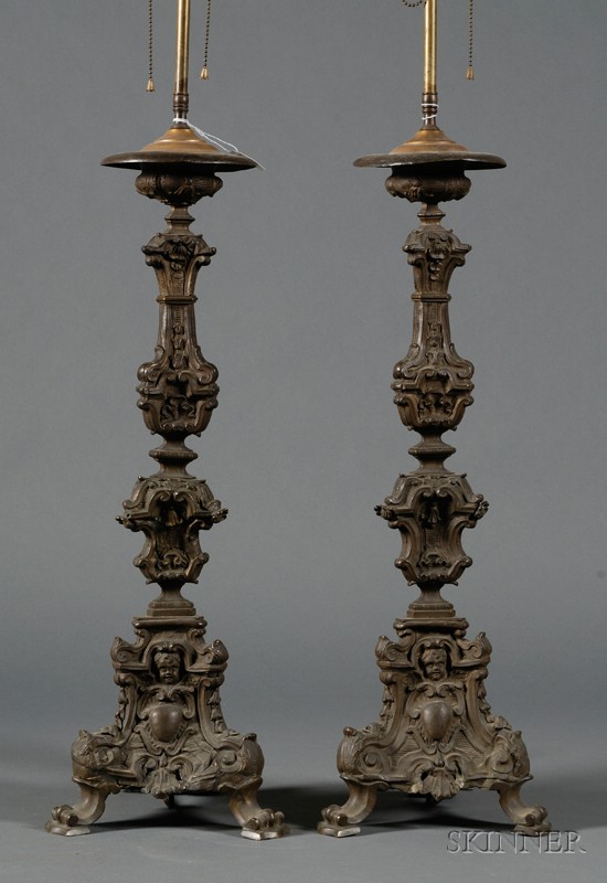 Appraisal: Pair of Tall Italian Pressed Metal Baroque Candlestick Lamp Bases