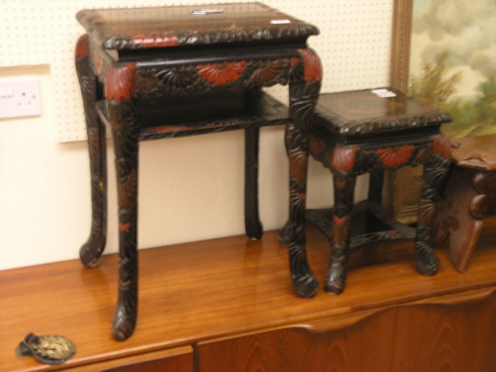 Appraisal: Two matching carved wood occasional tables with painted floral detail