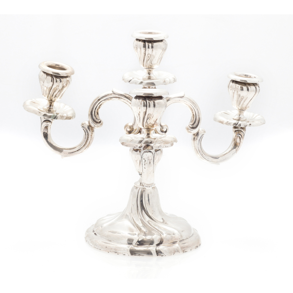 Appraisal: A four light three branch Continental candleabra German marks marked