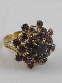 Appraisal: A yellow metal tests ct gold garnet dress ring