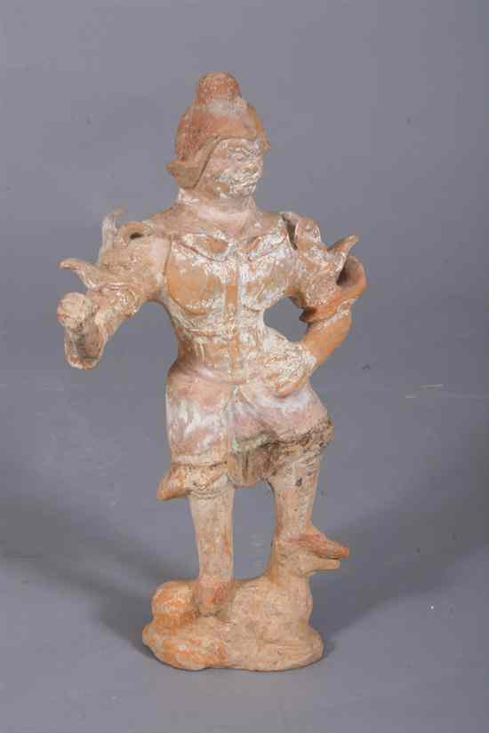 Appraisal: CHINESE POTTERY FIGURE OF A WARRIOR Tang Dynasty - in