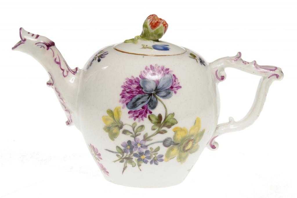 Appraisal: A MEISSEN TEAPOT AND COVER with puce dolphin spout and